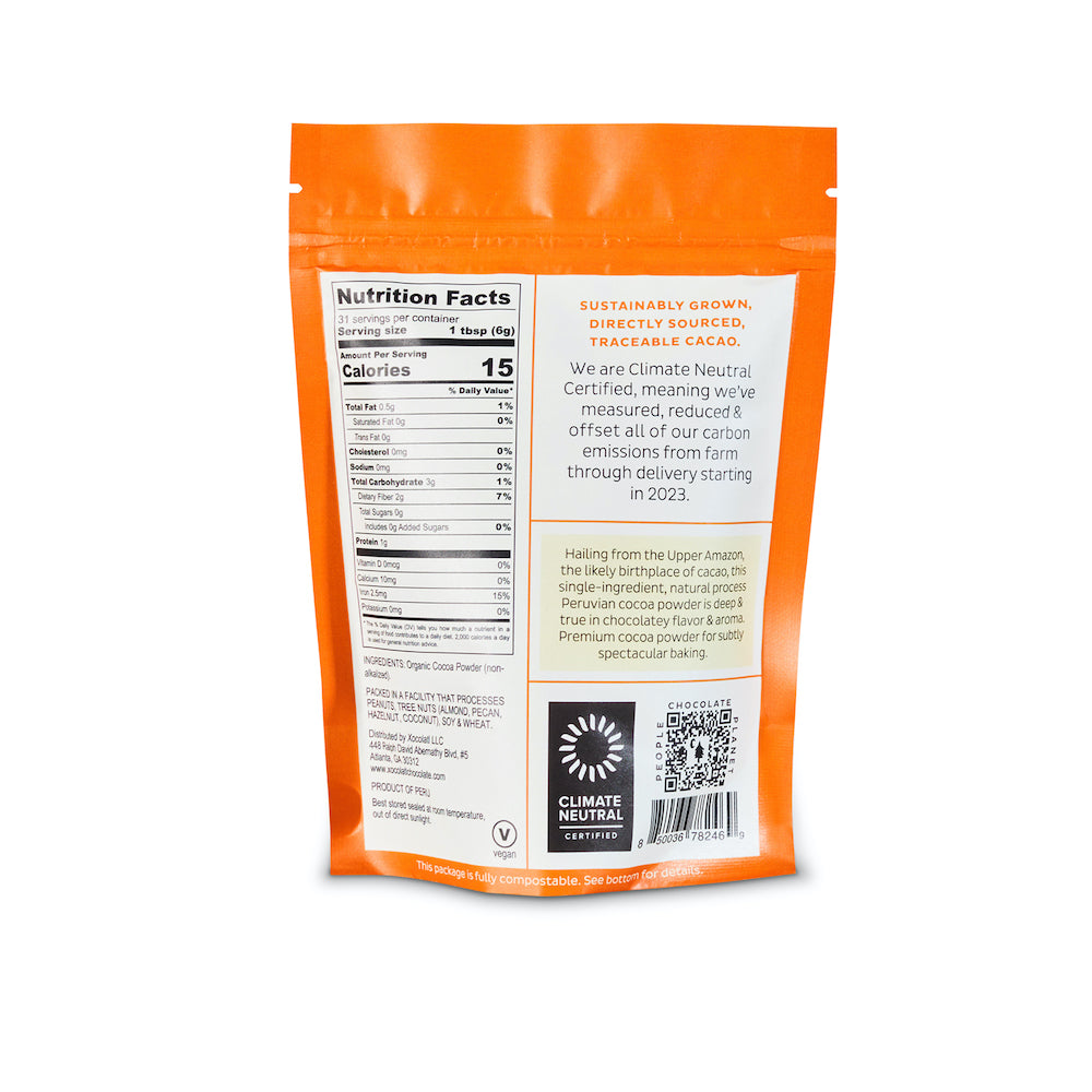 The back of a pouch of Xocolatl Chocolate Cocoa powder, listing the Nutrition Facts and Ingredient List, as well as a vegan symbol and a "Climate Neutral Certified" badge.